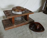 Wooden pipe stand with glass jar and ceramic ashtray