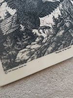 Close-up bottom corner of eagle print showing copyright and title