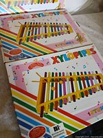 Two XyloPipes boxes front view showing product image and branding