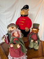 Group shot of all four holiday figures on table