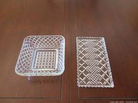 Square bowl and rectangular tray side by side on table showing overall form and pattern