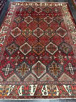 Full view of rug showing entire field and borders