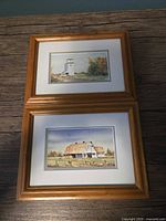 Both framed watercolor paintings stacked vertically showing art and frames
