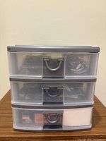 Closed three-drawer plastic organizer
