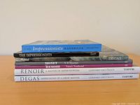 Stacked view showing all seven spines for title verification