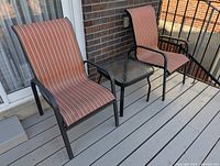 Chairs and table staged on deck showing overall set