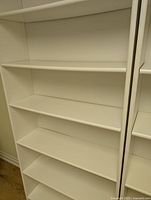 Close-up of shelf area on adjoining units showing surface wear