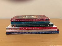 All six books stacked, showing spines and titles