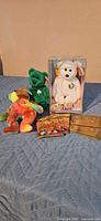All items: three Beanie bears, trading card packs and gold membership cards