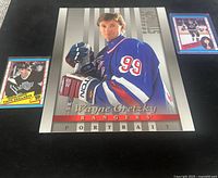 All three Wayne Gretzky cards; oversized Donruss Studio portrait centered, two 1989 O-Pee-Chee cards flanking