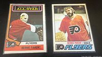 Fronts of both Bernie Parent hockey cards side by side