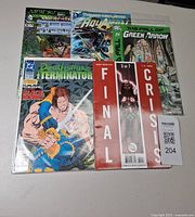 All five comic books overlapped in one frame