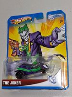 Front of sealed Hot Wheels The Joker card showing vehicle and artwork