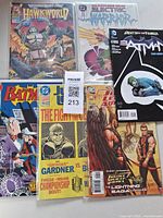 Group shot showing all six bagged DC comics in the lot