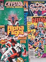 Group shot of all four Marvel comic book fronts