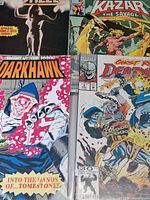 Group shot of four Marvel comic books: Dazzler #21, Ka-Zar The Savage, Darkhawk, Ghost Rider vs Deathlok