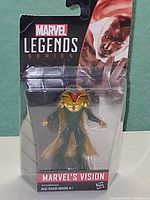 Front of sealed Marvel Legends Series Vision figure package