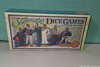 Front of sealed Shipmates Dice Games box showing artwork of sailors and title