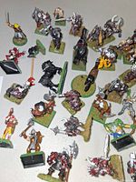 Overview of painted Warhammer/LOTR plastic miniatures on bases