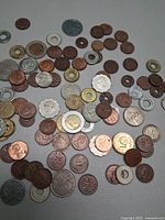 Overview of mixed coins spread on surface