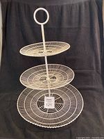 full view of white 3-tier wire stand