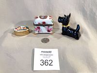 All three trinket boxes with size reference coin