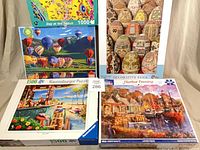 Five puzzle boxes displayed