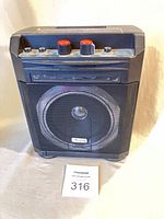Front view of Harmony amplifier showing speaker grille and logo