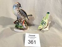 Both ceramic bird figurines full view