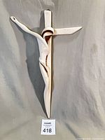 Full view of ceramic crucifix showing entire shape and scale