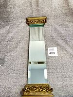 Full view of Grecian column style mirror