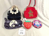 Group shot of all five purses