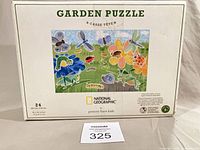 Front of puzzle box showing title, image and branding