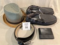 Group shot showing all four items: hat, slippers, belt, wallet