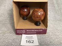Retail box containing two sphere finials
