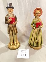 male and female chalkware caroler figurines full view