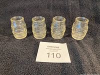 All four Jim Beam 200th Anniversary shot glasses front view