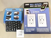 Retail packages of 2-pack Feit Electric USB outlets and flexible USB keyboard