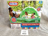 Front of box showing Little Tikes branding, product name, and illustration of pool in use