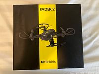 Front of retail box showing Fader 2 drone image and branding