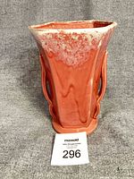 Front view of McCoy pink drip glaze vase with lot tag visible