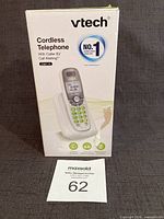 Front of retail box showing VTech CS6114 cordless telephone