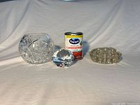 All three glass items: cut glass bowl, diamond paperweight, glass pen holder; cranberry can for scale