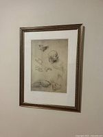 Front view of framed Da Vinci sketches print