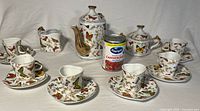 Full set front view with teapot, creamer, sugar, six cups and saucers