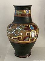 Front view of Nippon porcelain vase showing hand-painted designs