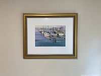 Framed watercolor on wall full view