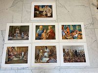 Seven samples of the medical history prints laid out on floor