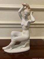 Front three-quarter view of the porcelain figurine