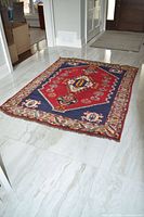 Full view of rug showing pattern and colours